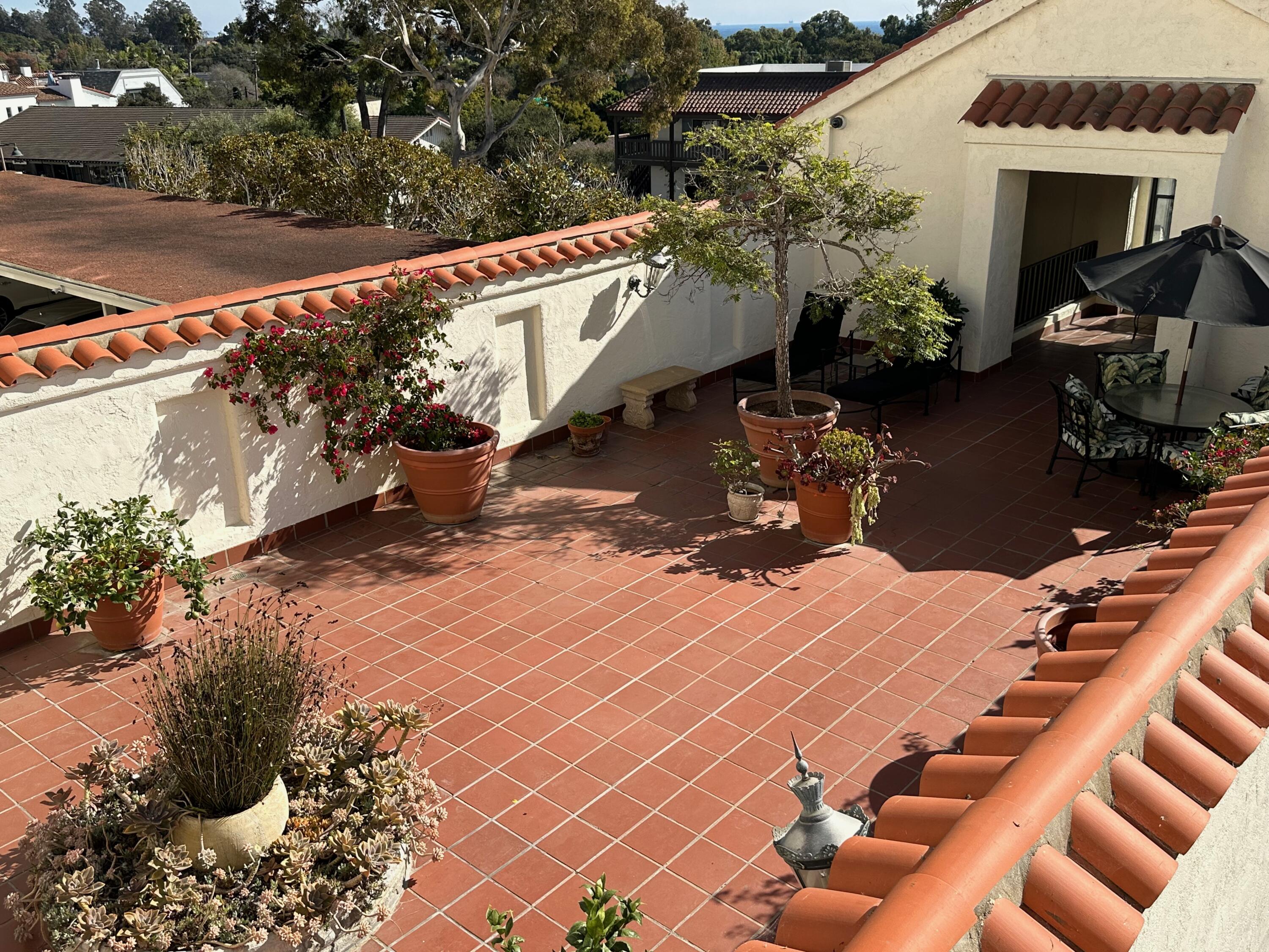 1220 Coast Village Road, Unit 208 Montecito, CA 93108 - Photo 11 of 11 a view of a backyard with sitting area