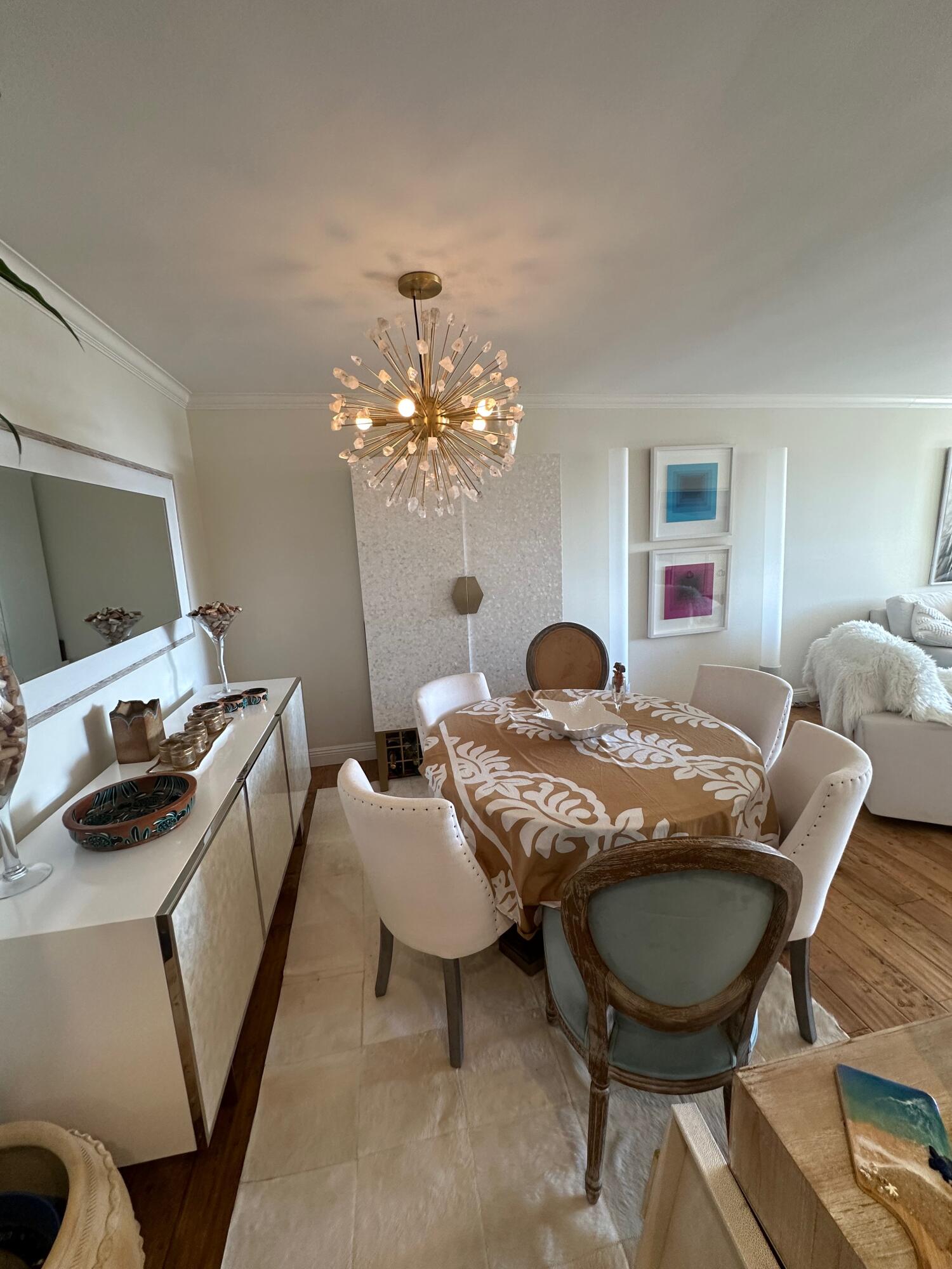 1220 Coast Village Road, Unit 208 Montecito, CA 93108 - Photo 6 of 11 a view of a livingroom with furniture and chandelier