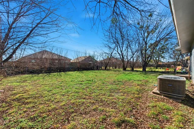 a view of a garden with an outdoor space