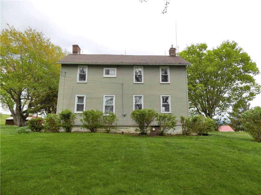 836 Little Summit Road Vanderbilt, PA 15486 - Photo 1 of 14 a front view of a house with a yard and green space