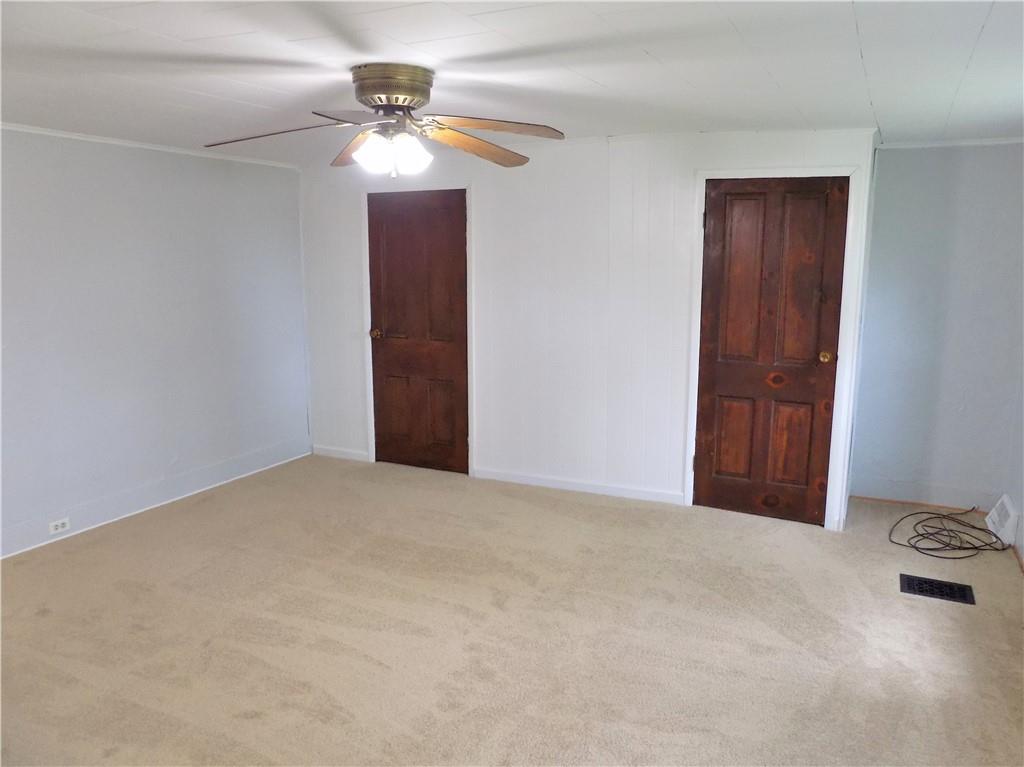 836 Little Summit Road Vanderbilt, PA 15486 - Photo 11 of 14 a view of a livingroom with a chandelier fan