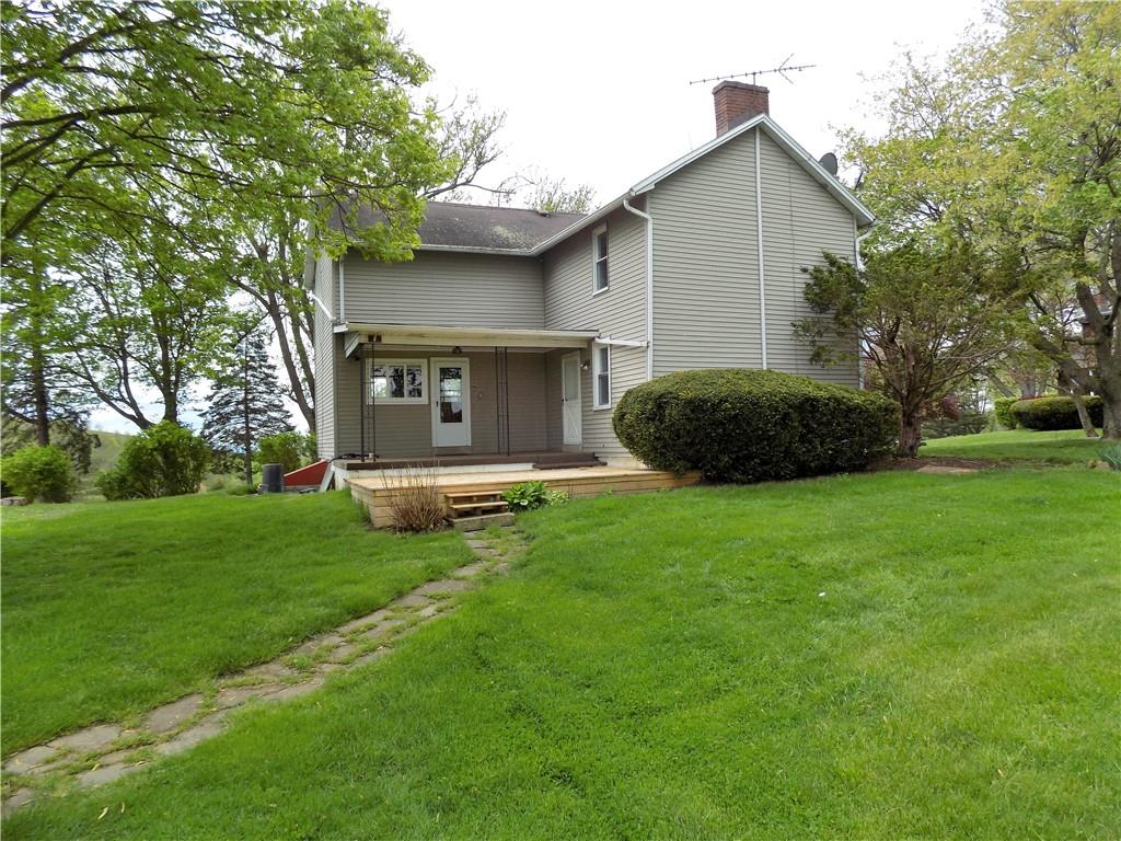 836 Little Summit Road Vanderbilt, PA 15486 - Photo 2 of 14 a view of a backyard with a garden and entertaining space