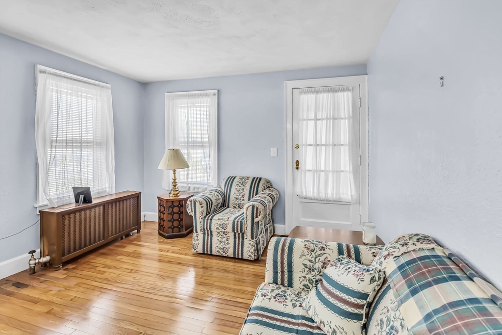 44 Cherrelyn Street Springfield, MA 01104 - Photo 11 of 36 a bedroom with furniture and a window