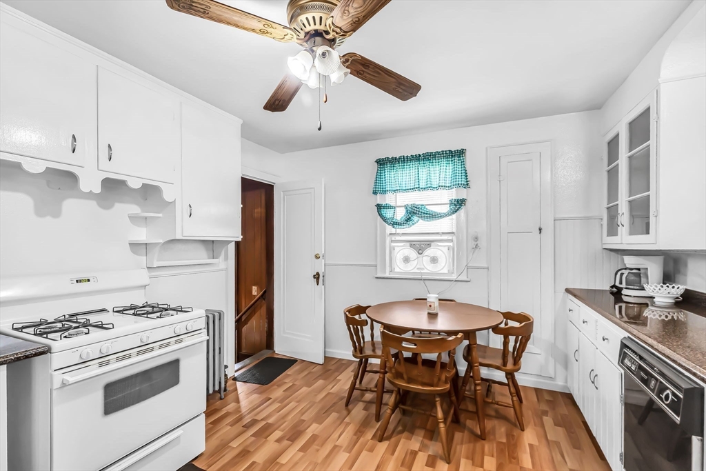 44 Cherrelyn Street Springfield, MA 01104 - Photo 19 of 36 a table and chairs in a kitchen