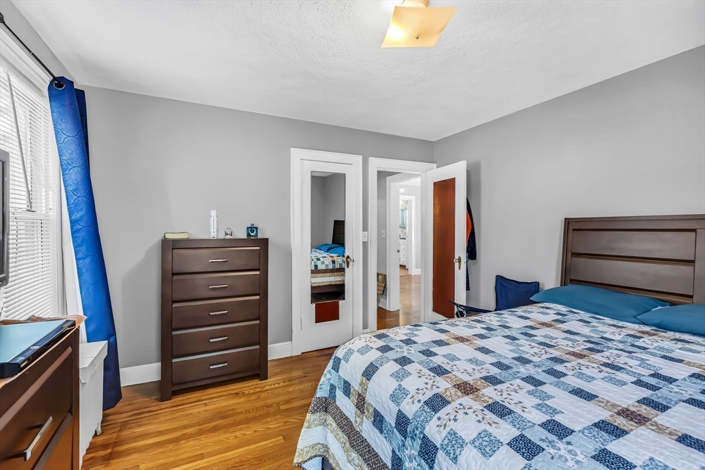 44 Cherrelyn Street Springfield, MA 01104 - Photo 24 of 36 a bedroom with a bed and a television