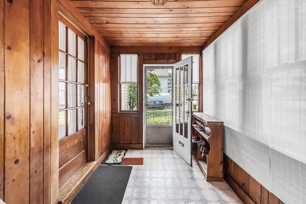 44 Cherrelyn Street Springfield, MA 01104 - Photo 33 of 36 a room with large windows and a balcony