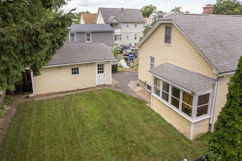 44 Cherrelyn Street Springfield, MA 01104 - Photo 4 of 36 a aerial view of a house with a yard