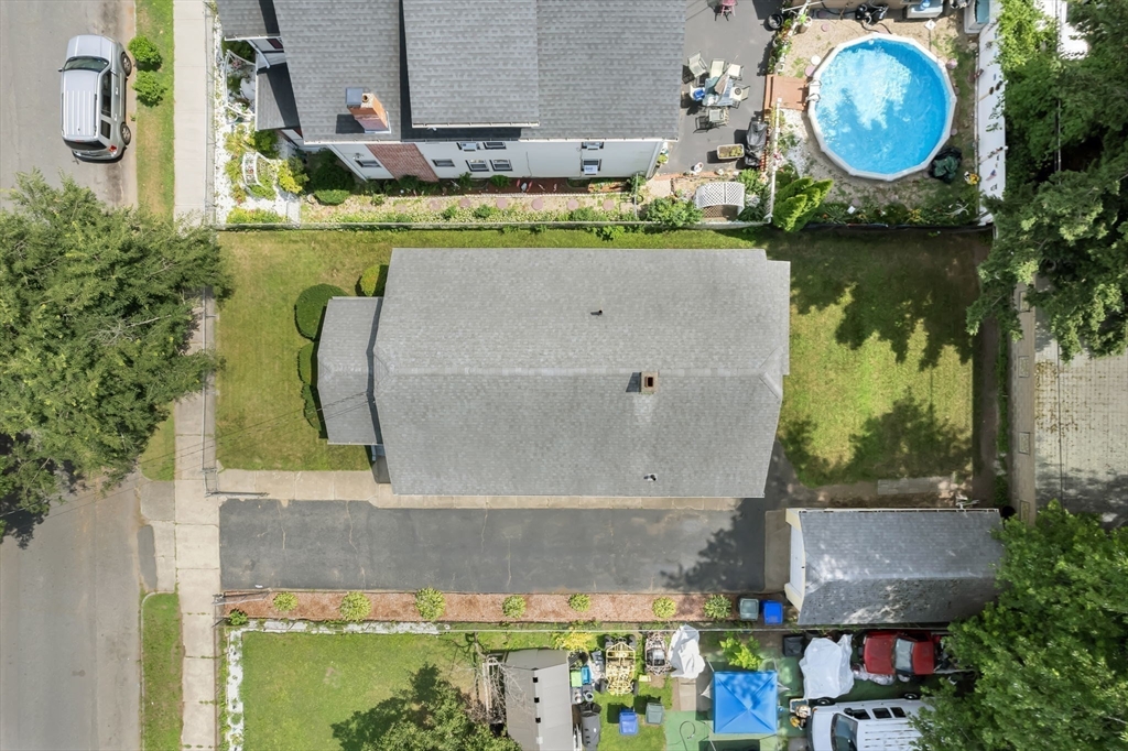 44 Cherrelyn Street Springfield, MA 01104 - Photo 8 of 36 an aerial view of a house with garden space and a lake view