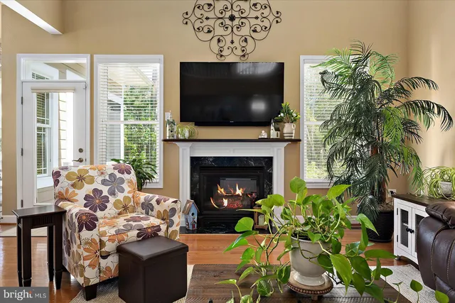 a view of a hallway with a window and stairs