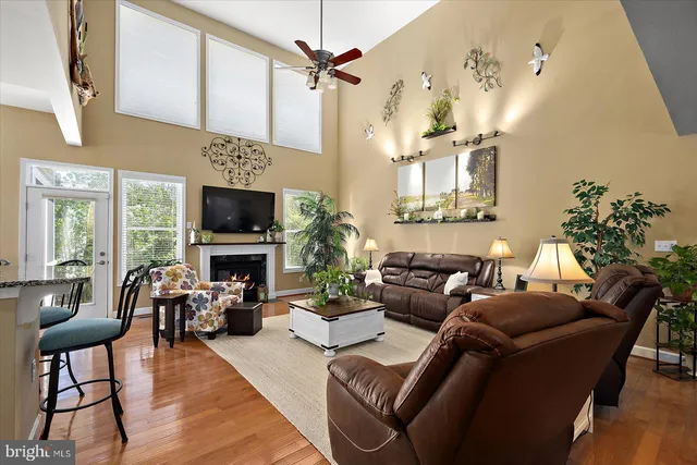 a spacious bedroom with a bed and a window