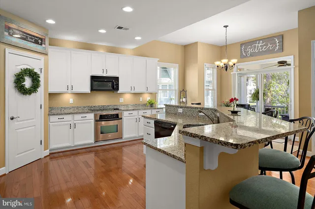 a bedroom with a bed and a night stand