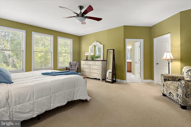 a balcony with furniture and garden view