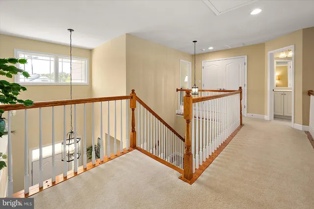 a front view of a house with a yard table and chairs