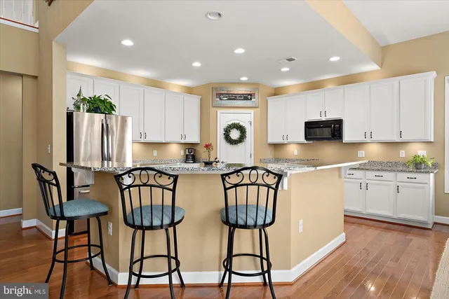 a bathroom with a bathtub and a sink