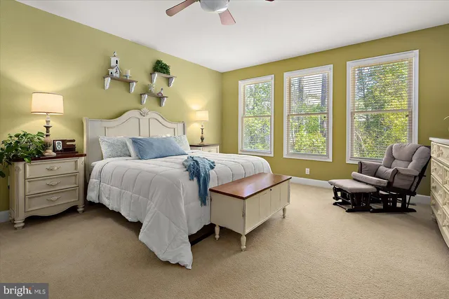 a view of a lake with a building in the background