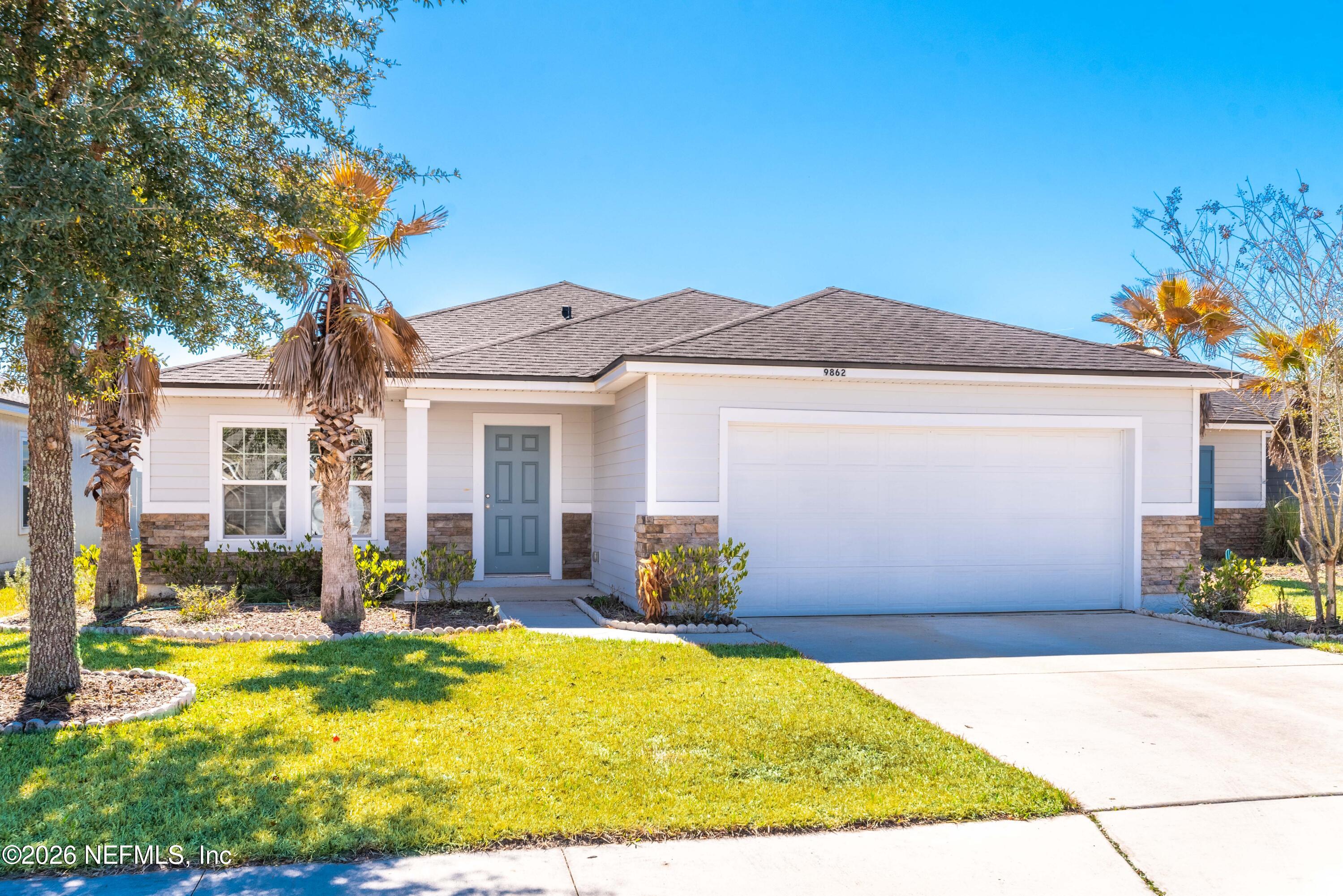 a front view of a house with swimming pool