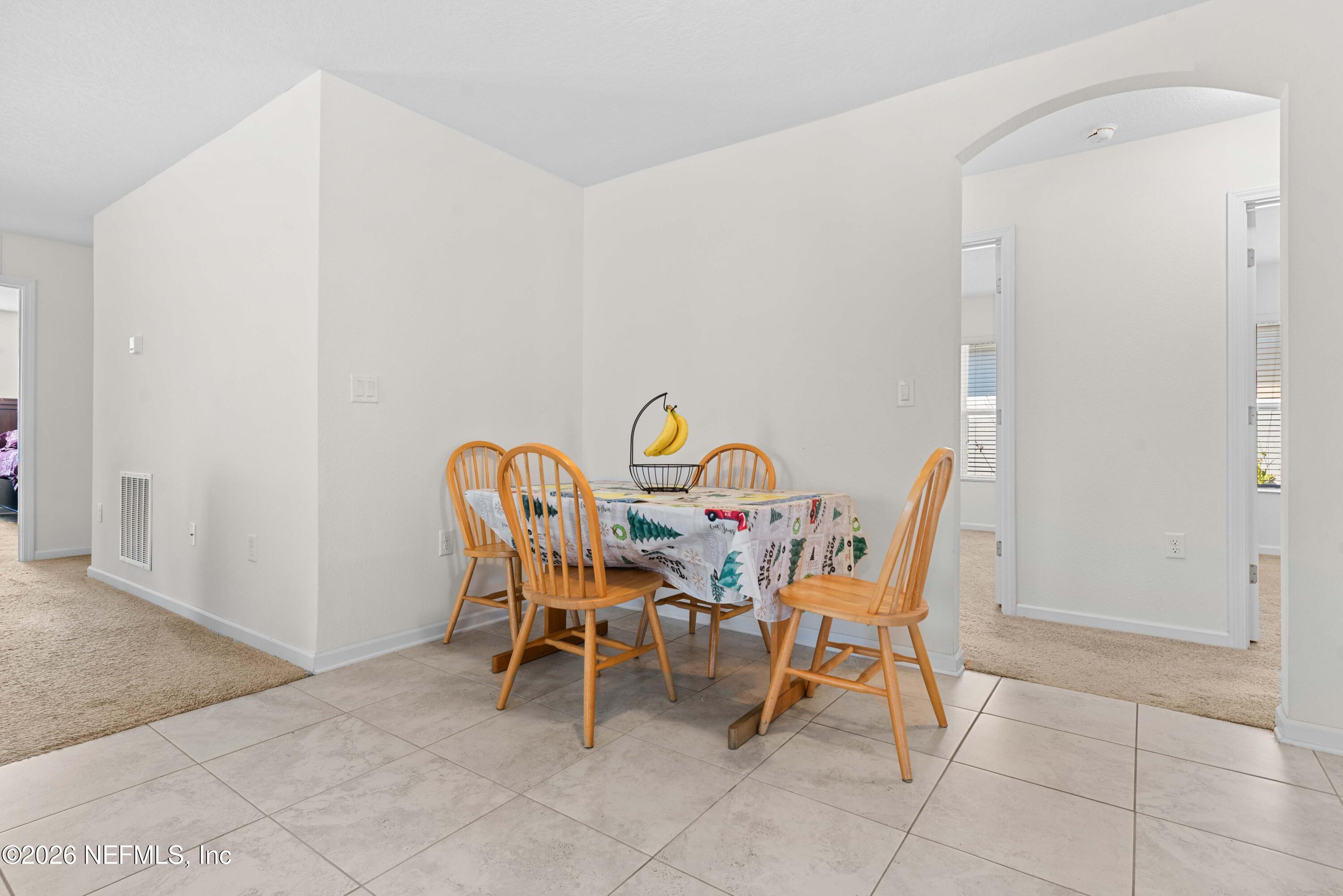 9862 Soldier Court Jacksonville, FL 32221 - Photo 13 of 30 a dining room with furniture and a window
