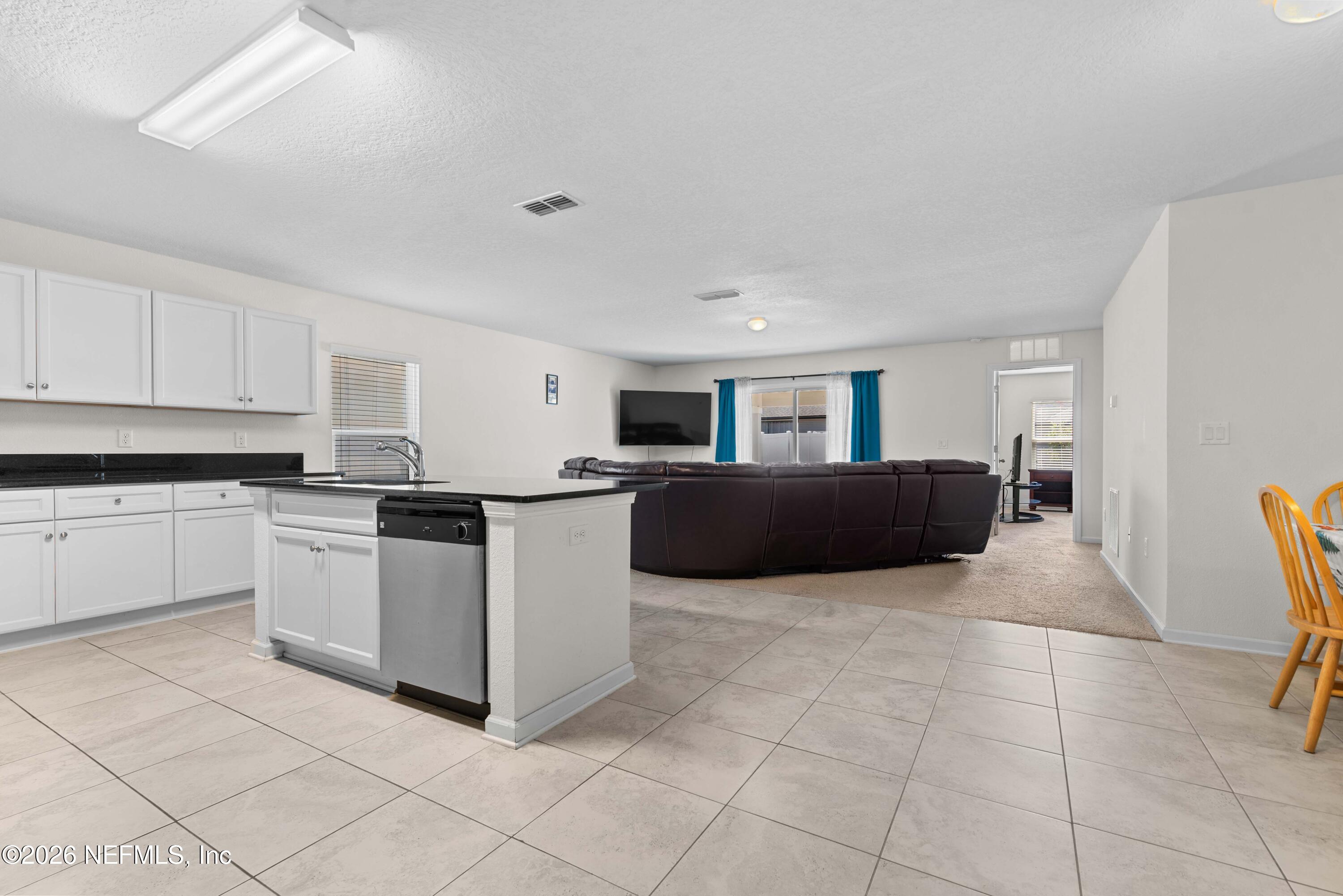 9862 Soldier Court Jacksonville, FL 32221 - Photo 15 of 30 a kitchen with cabinets and furniture