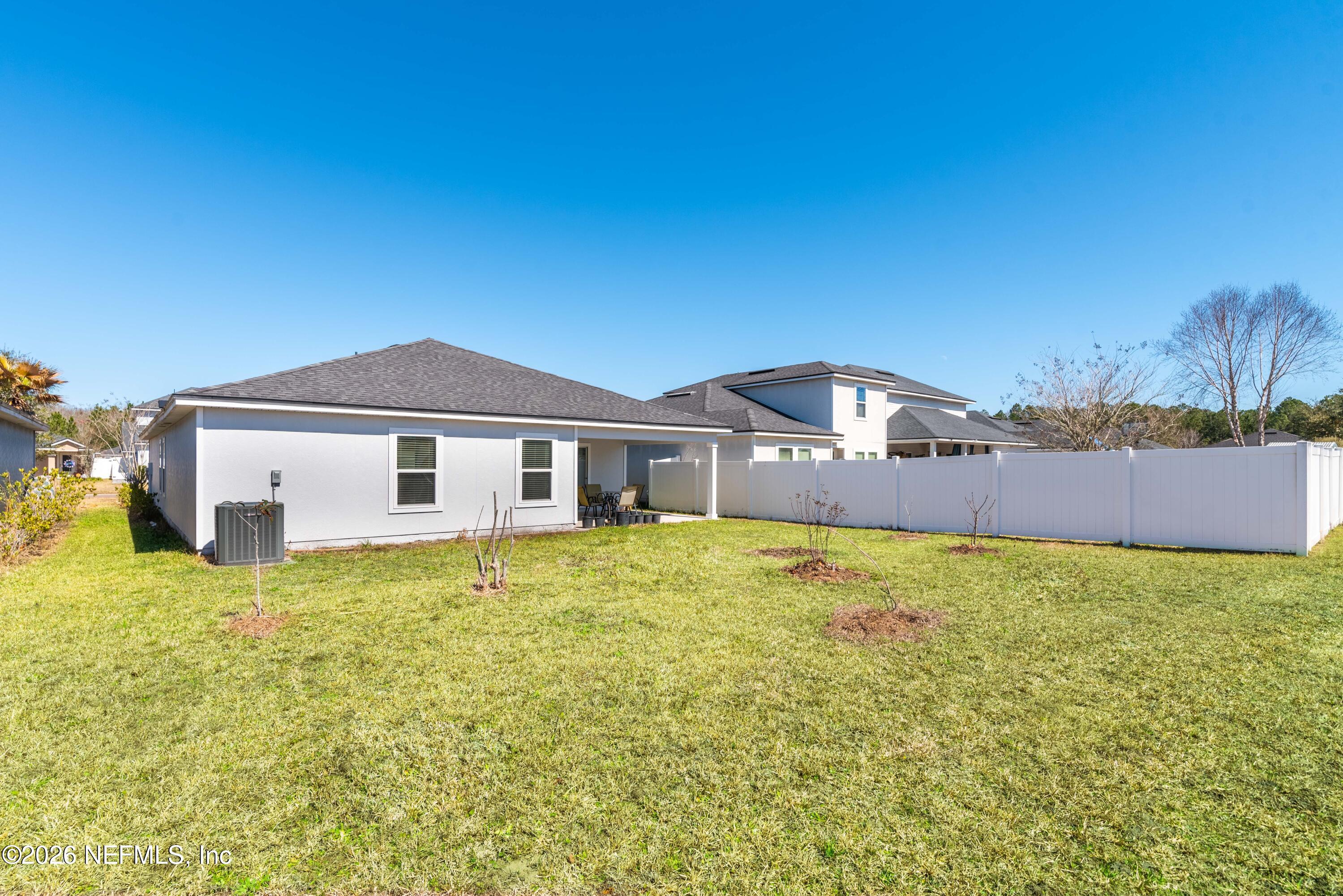 9862 Soldier Court Jacksonville, FL 32221 - Photo 26 of 30 a house with trees in the background