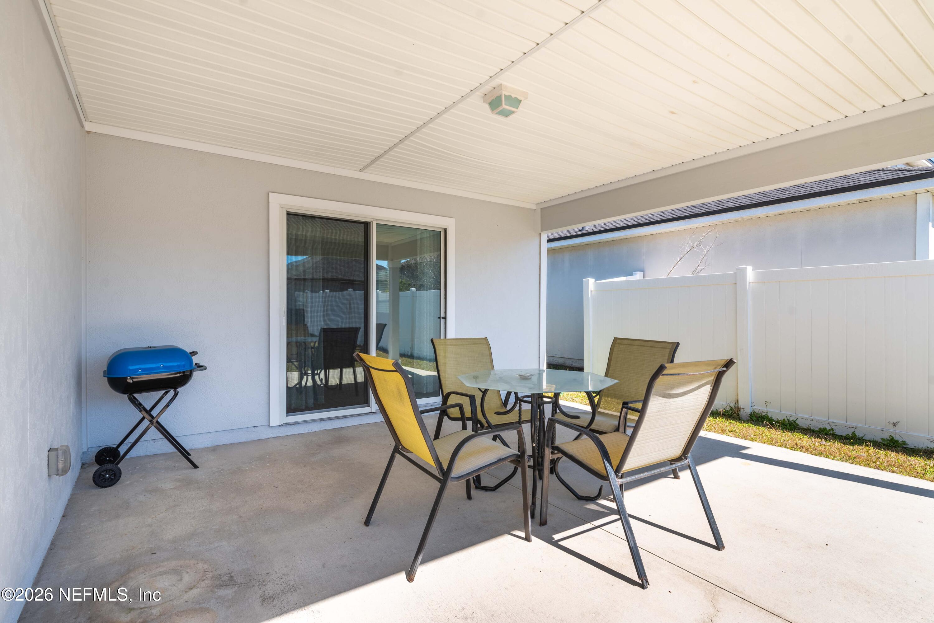 9862 Soldier Court Jacksonville, FL 32221 - Photo 27 of 30 a dining room with furniture and a window
