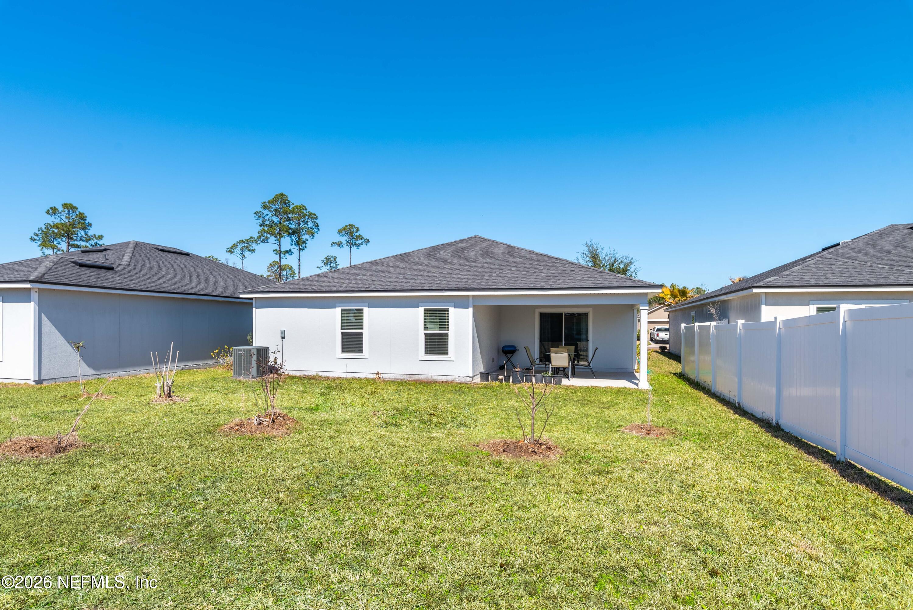 9862 Soldier Court Jacksonville, FL 32221 - Photo 29 of 30 a view of a house with a yard
