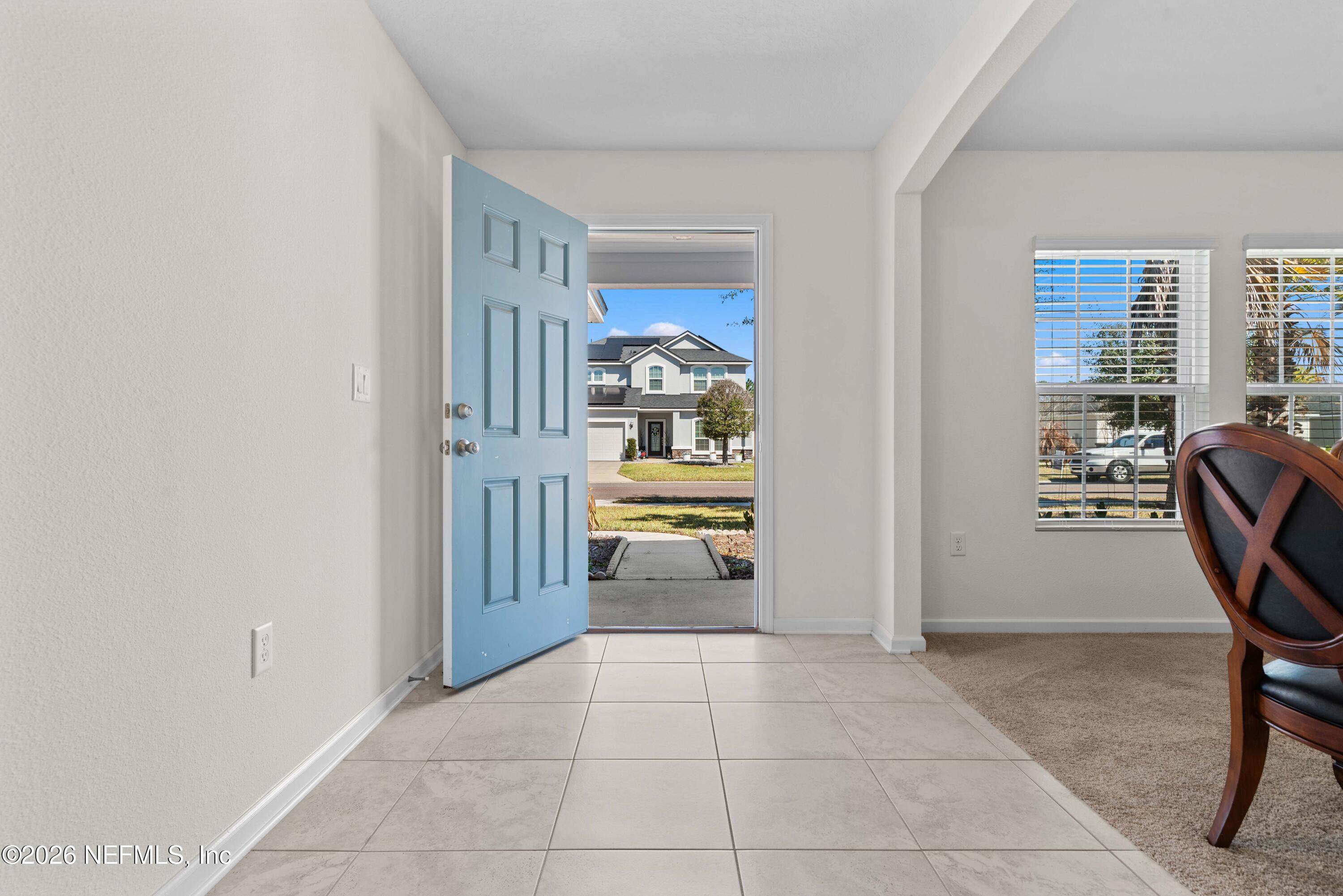 9862 Soldier Court Jacksonville, FL 32221 - Photo 4 of 30 a view of a livingroom with furniture and a window