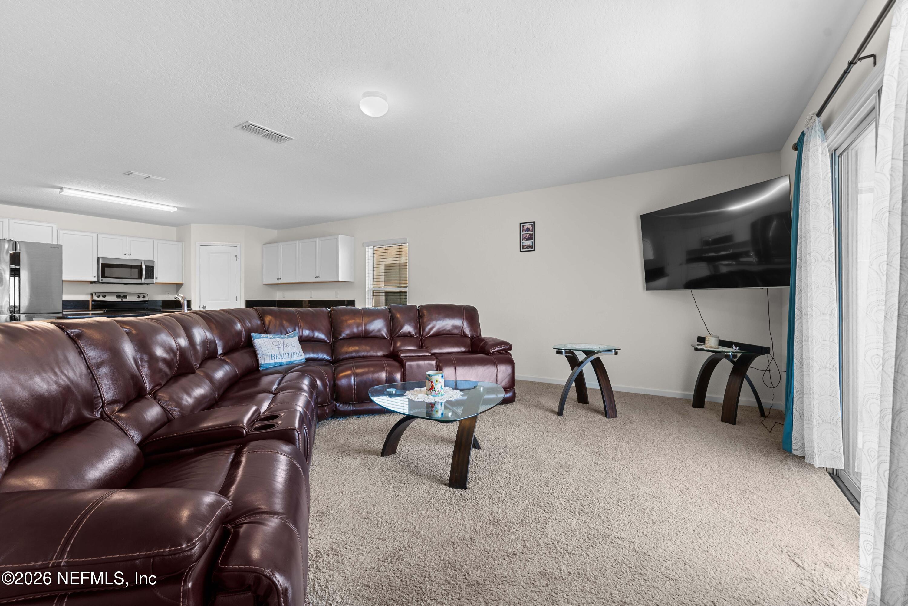 9862 Soldier Court Jacksonville, FL 32221 - Photo 7 of 30 a living room with furniture