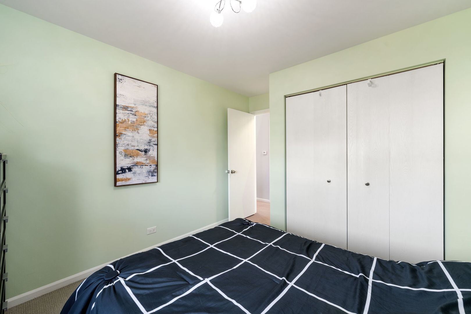 748 Sterling Court, Unit A2 Bartlett, IL 60103 - Photo 17 of 27 a room with gym equipment