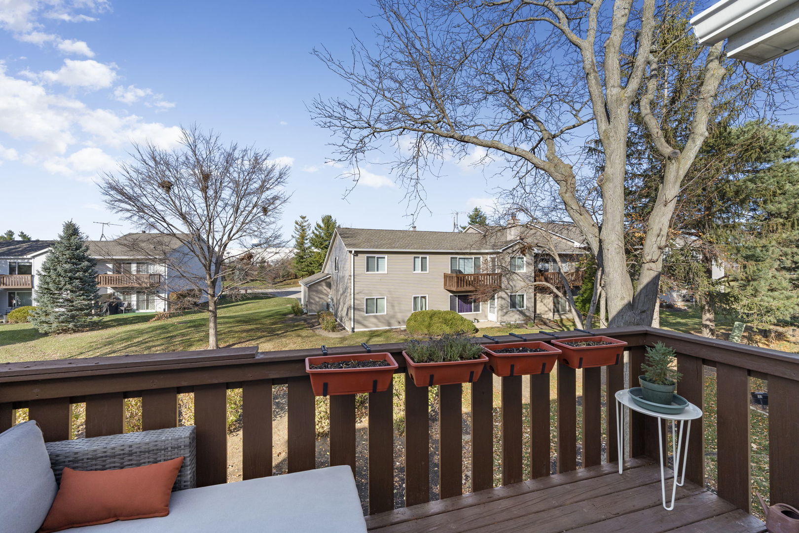748 Sterling Court, Unit A2 Bartlett, IL 60103 - Photo 22 of 27 a view of a two chairs on the roof deck