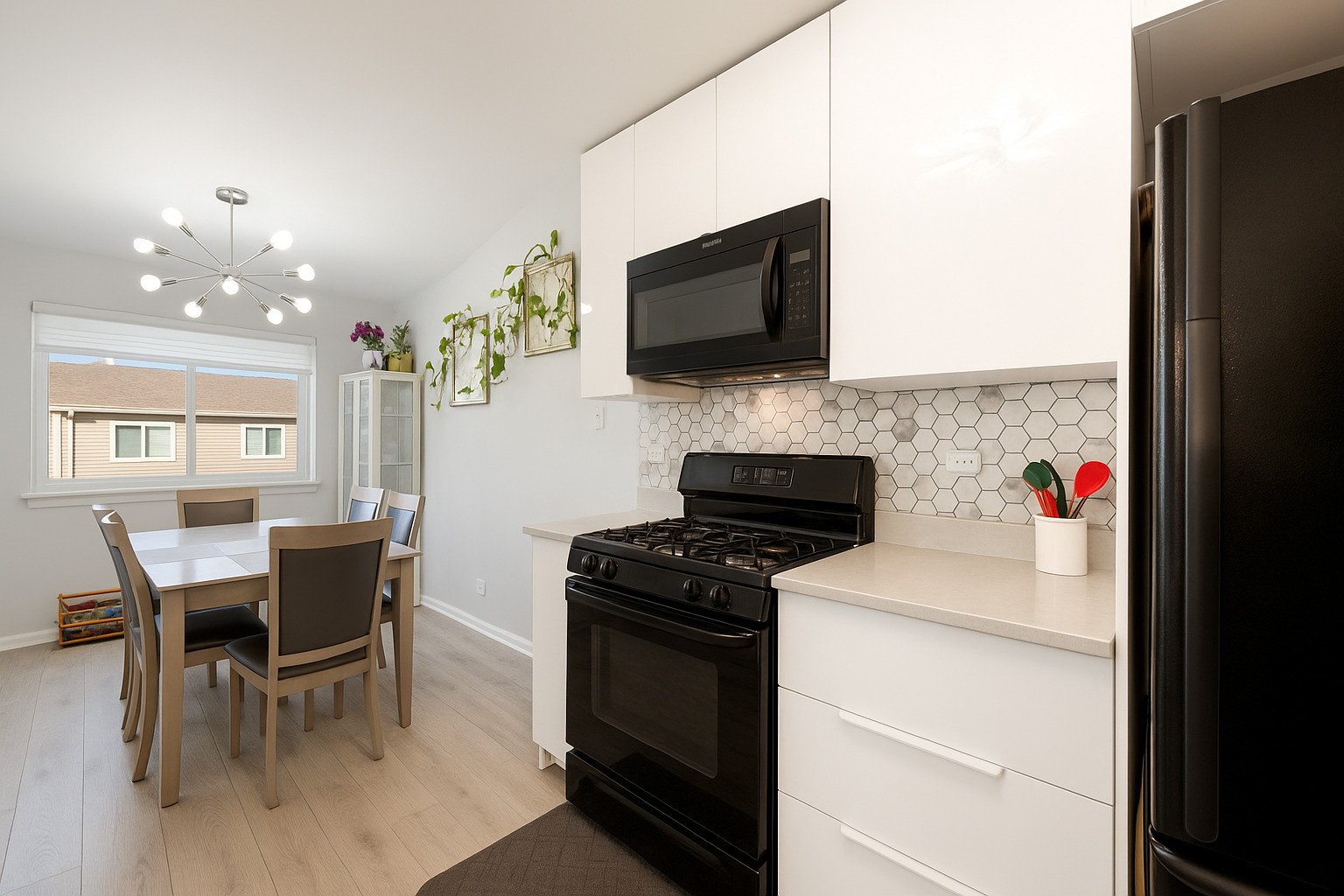 748 Sterling Court, Unit A2 Bartlett, IL 60103 - Photo 7 of 27 a kitchen with a stove and a microwave