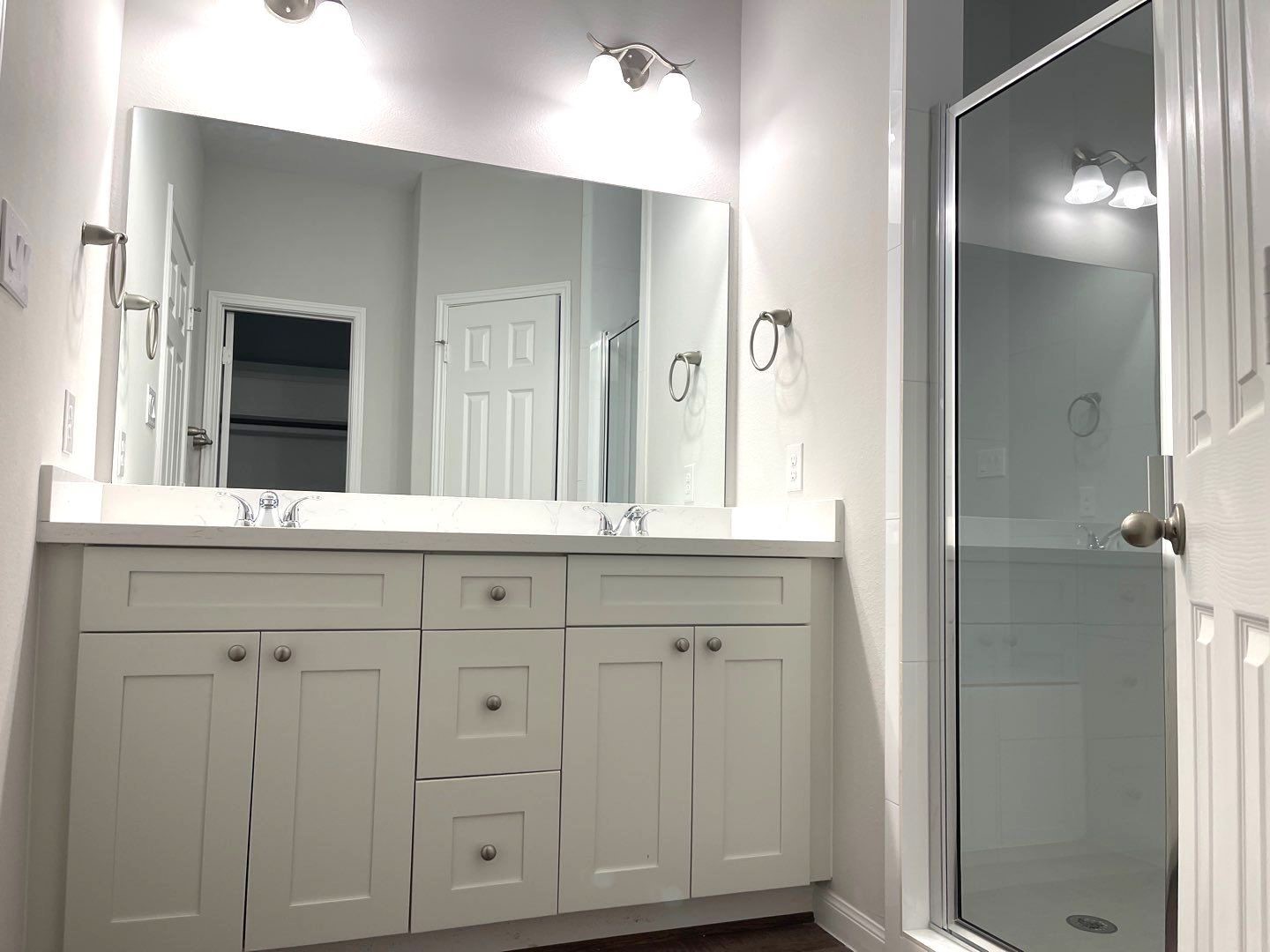 287 Road 5102 Cleveland, TX 77327 - Photo 8 of 16 a bathroom with a granite countertop sink and a mirror