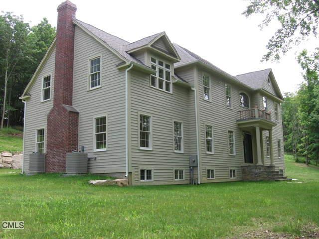 40 Old Mill Road Wilton, CT 06897 - Photo 1 of 1 a view of a house with a backyard