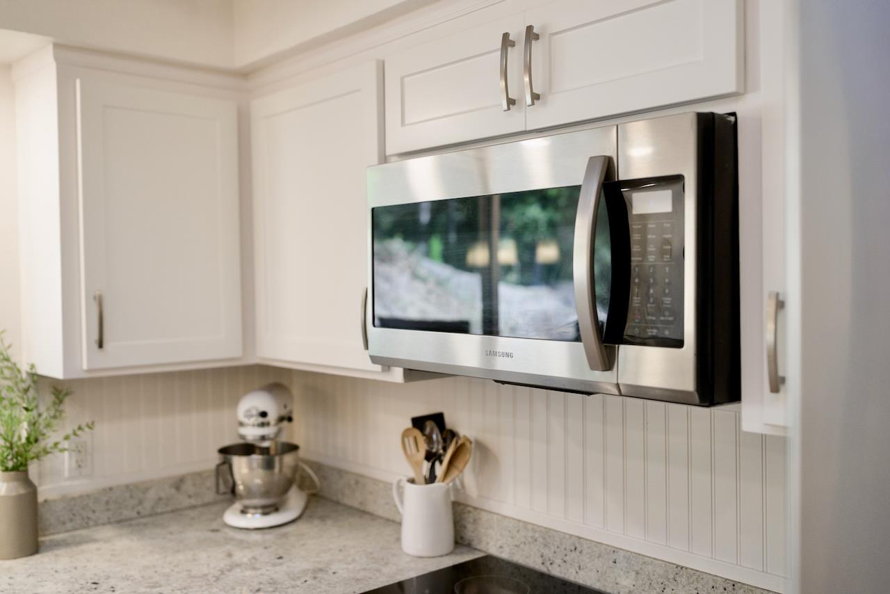 155 Rabbits Run Road Santa Cruz, CA 95060 - Photo 34 of 113 a kitchen with stainless steel appliances a cabinets and a counter top space