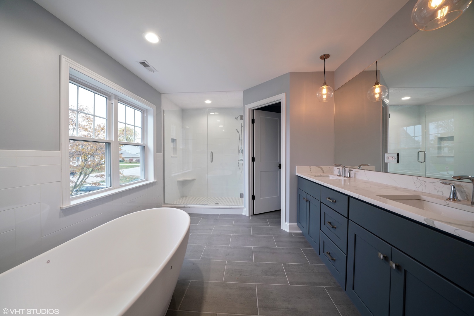 1205 Ridge Road Westmont, IL 60527 - Photo 13 of 16 a bathroom with a tub sink shower and mirror