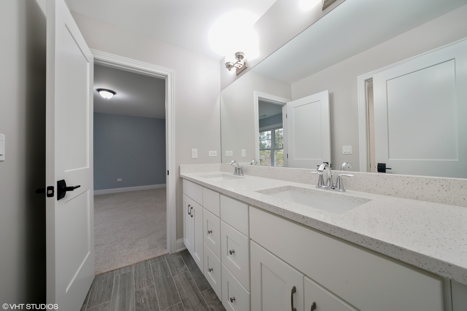 1205 Ridge Road Westmont, IL 60527 - Photo 15 of 16 a bathroom with a double vanity sink and mirror