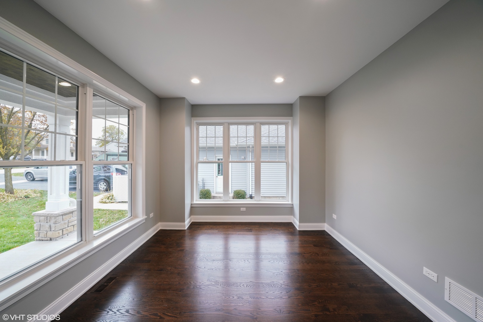 1205 Ridge Road Westmont, IL 60527 - Photo 4 of 16 wooden floor in an empty room with a window