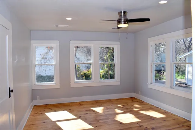 a view of an empty room and window