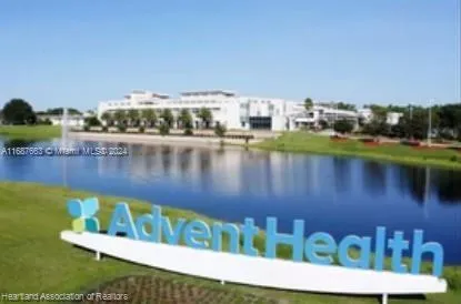 a view of a lake with outdoor space