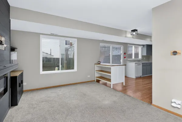 a room with furniture and window