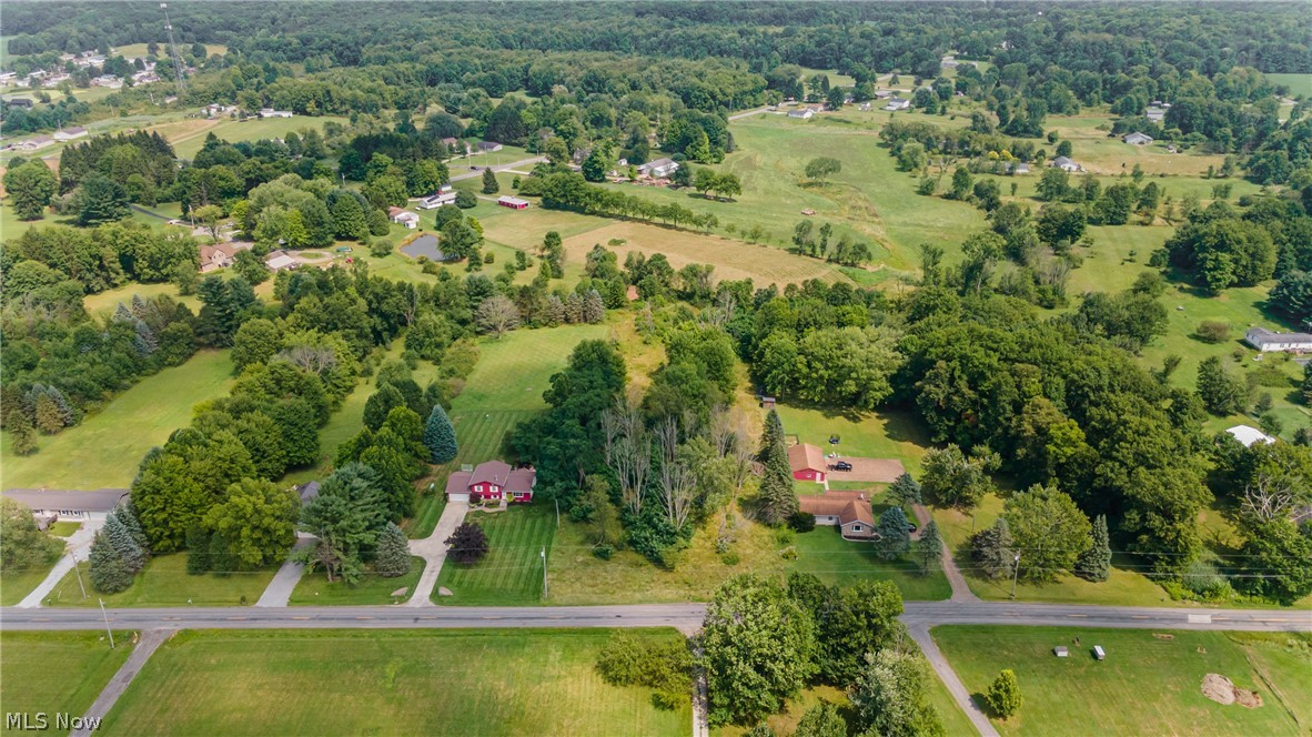 Stanley Road Garrettsville, OH 44231 - Photo 2 of 17 Vacant lot features a mix of mature trees and open grassy areas.