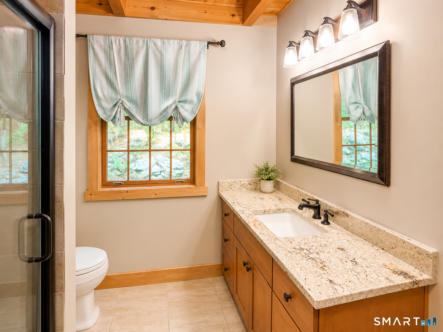 44 Pine Road Colebrook, CT 06021 - Photo 14 of 40 a bathroom with a granite countertop sink and a mirror
