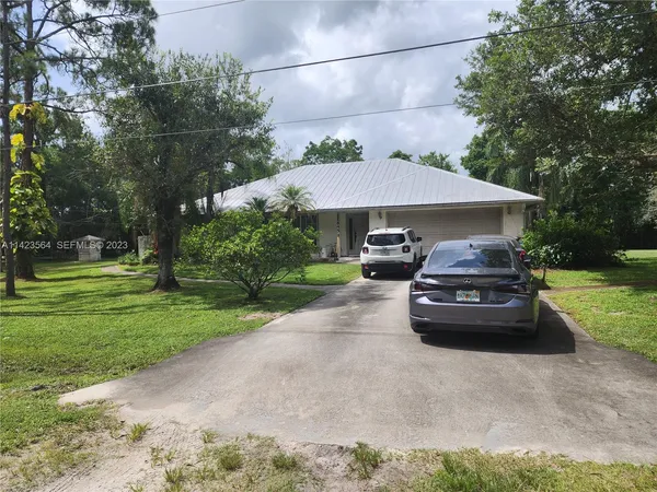 a car parked in front of a house