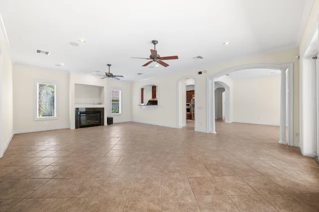 a kitchen with granite countertop a sink and a stove