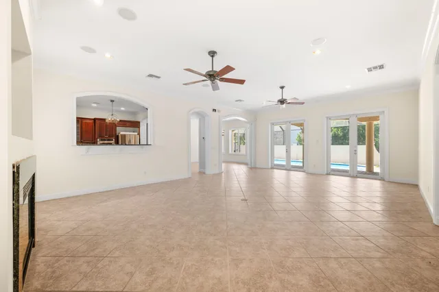 a kitchen with granite countertop a stove and a sink