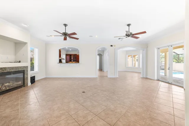 a kitchen with stainless steel appliances granite countertop a stove and cabinets
