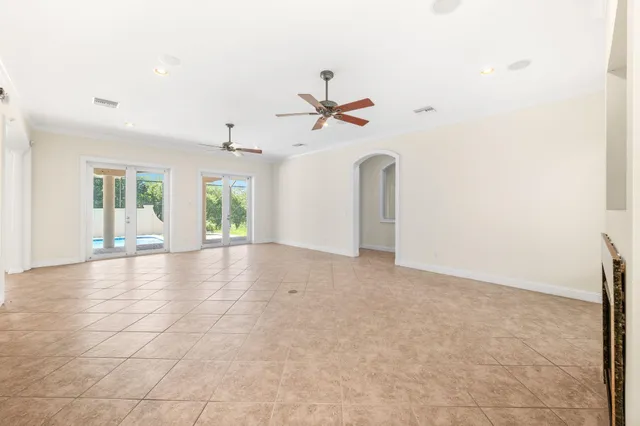a kitchen with stainless steel appliances granite countertop wooden cabinets and a sink