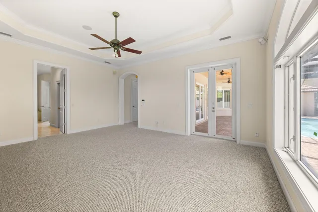 a spacious bathroom with a granite countertop sink mirror and a