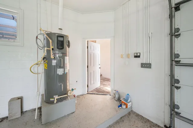 a view of a lake with houses in the back