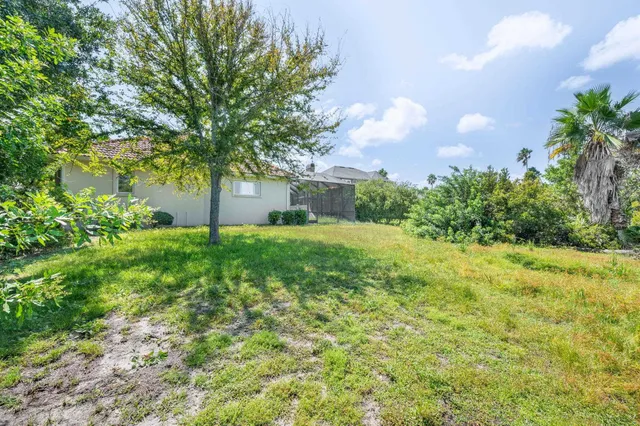 a view of a swimming pool with a garden