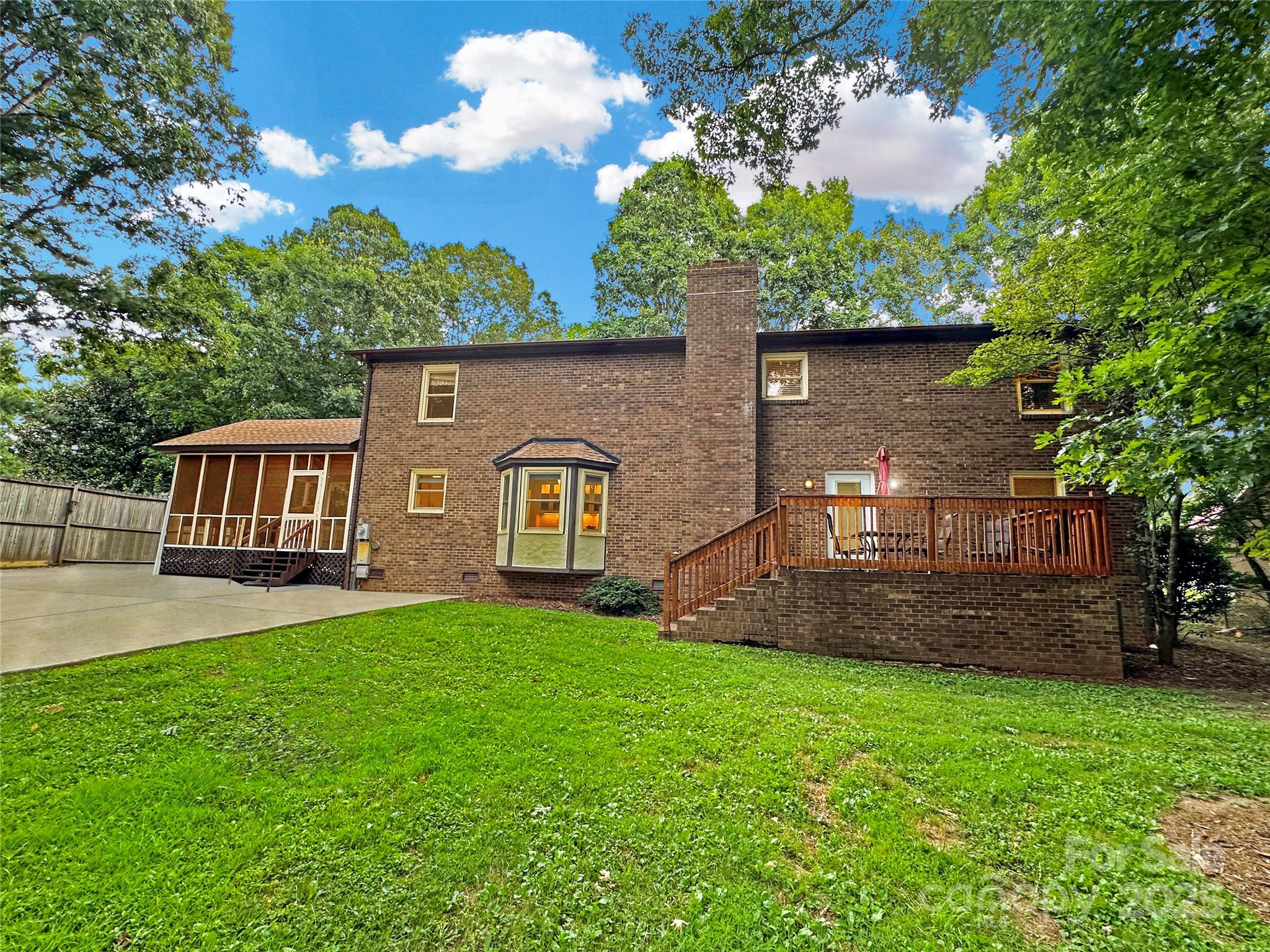 3245 15th Street Northeast Hickory, NC 28601 - Photo 2 of 39 a front view of a house with a yard